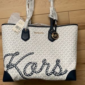 Brand new never used Michael Kors purse